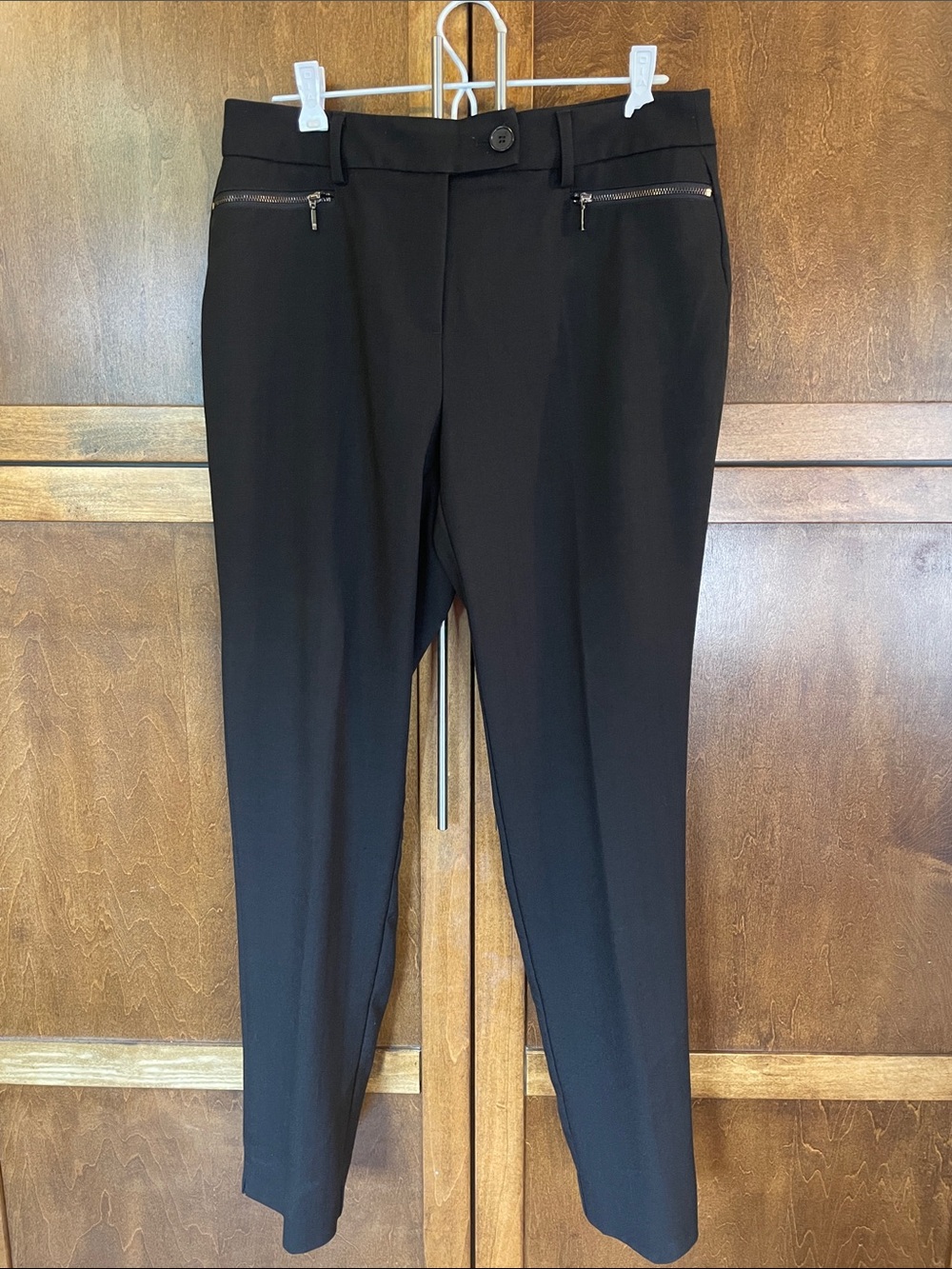 Cleo Curvy black slim leg dress pants.